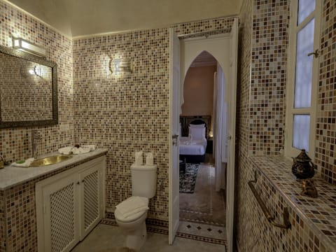 Family Suite | Bathroom | Hydromassage showerhead, hair dryer, bathrobes, towels