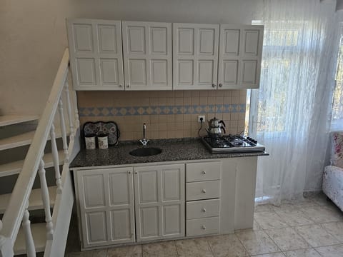 Comfort Duplex | Private kitchen | Fridge, stovetop, highchair, cookware/dishes/utensils