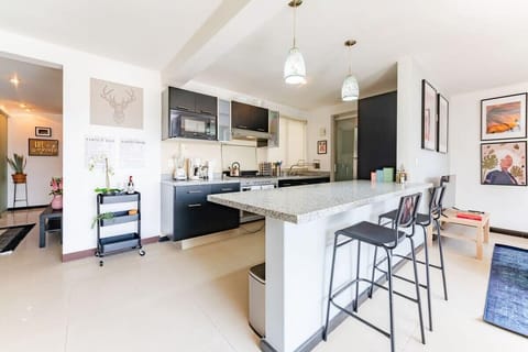 Pull up a seat at the breakfast bar for a coffee or snack