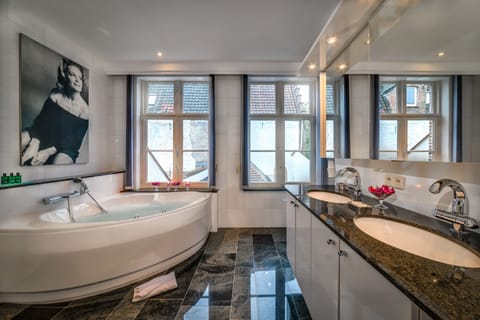 Luxury Suite, Canal View | Bathroom | Separate tub and shower, deep soaking tub, designer toiletries