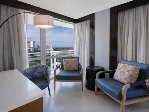 Room, 1 King Bed, Ocean View, Corner | Living area | 55-inch flat-screen TV with satellite channels