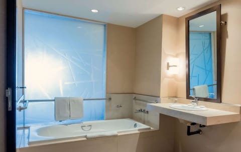 Room, 1 King Bed, Accessible (Roll-In Shower) | Bathroom | Separate tub and shower, hair dryer, towels, soap