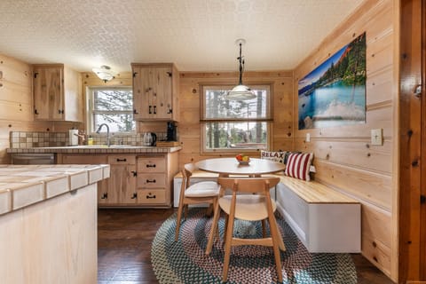 Updated kitchen with a cozy breakfast nook.