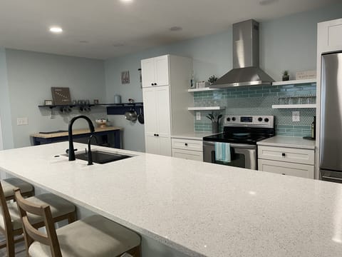 Additional seating at kitchen counter.