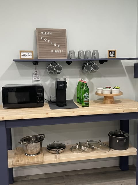 Make a pot of coffee OR one-cup Keurig.  Coffee and supplies provided.