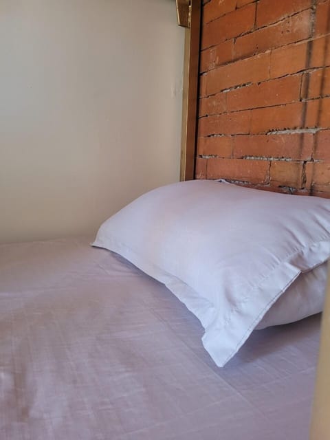 Shared Dormitory | Iron/ironing board, free WiFi, bed sheets