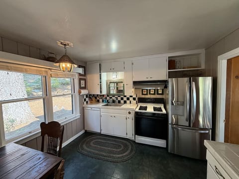 Kitchen vibes: modern appliances, rustic charm, and zero stress.