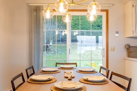 Yard access near the dining table.