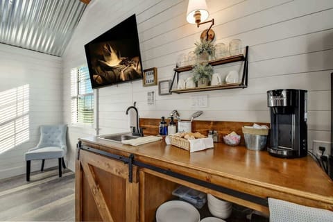 Flat screen TV and workspace.