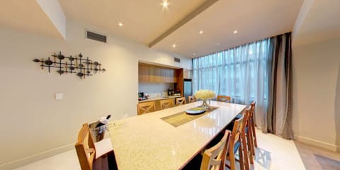 Four Bedroom Suite | Living area | 50-inch flat-screen TV with cable channels, TV