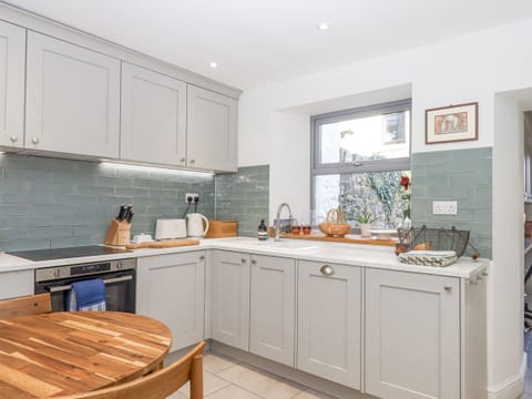 Fridge, electric kettle, toaster, cookware/dishes/utensils