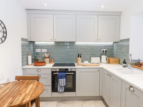 Fridge, electric kettle, toaster, cookware/dishes/utensils