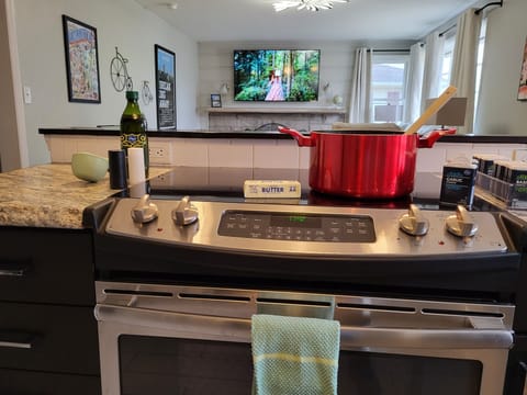 Watch TV and socialize while spending quality time in the open concept kitchen.