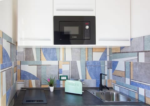 Deluxe Double or Twin Room | Private kitchen | Fridge, stovetop, espresso maker, coffee/tea maker