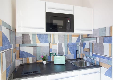 Deluxe Double or Twin Room | Private kitchen | Fridge, stovetop, espresso maker, coffee/tea maker