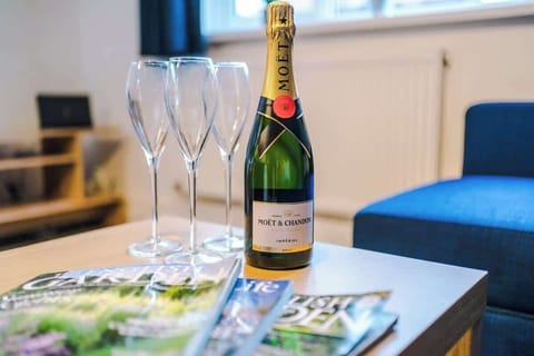 The open plan living room benefits from a double sofa bed, 4 seater dining table and fully equipped kitchen.