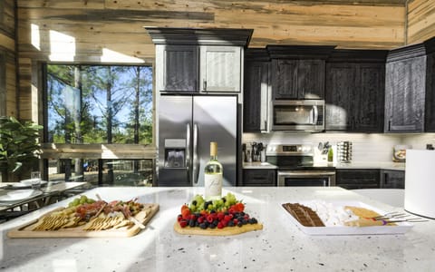 Step into our inviting, spacious kitchen, where every meal becomes a memory-making adventure for you and your loved ones!