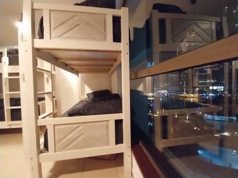 Standard Shared Dormitory, Women only, Non Smoking, Pool View | In-room safe, individually decorated, individually furnished