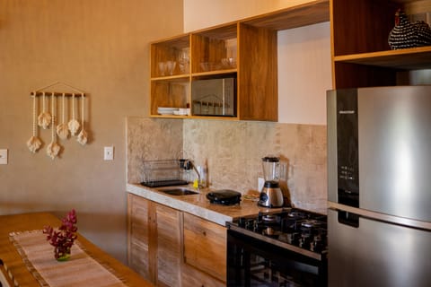 Deluxe Apartment | Private kitchen | Full-size fridge, microwave, toaster, highchair