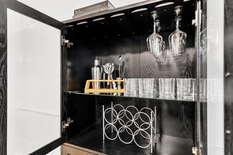 Mixology Corner: A stylish, well-appointed home bar, perfect for crafting your favorite cocktails.