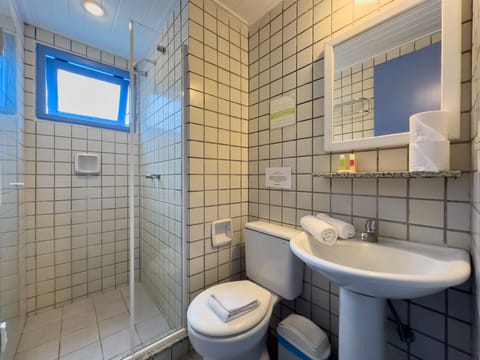 Economy Triple Room | Bathroom | Shower, towels, soap, shampoo