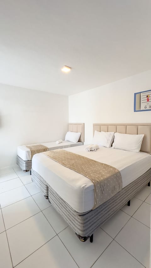 Family Room, 2 Bedrooms, 2 Bathrooms, Courtyard View | Minibar, free WiFi, bed sheets