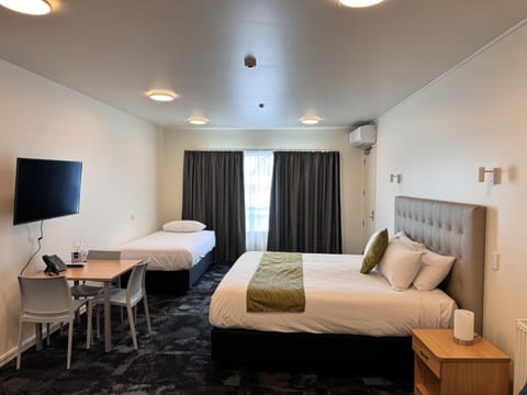 Deluxe Studio | Individually furnished, desk, laptop workspace, iron/ironing board
