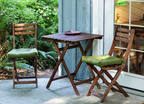 The front porch is a lovely spot for coffee in the morning.