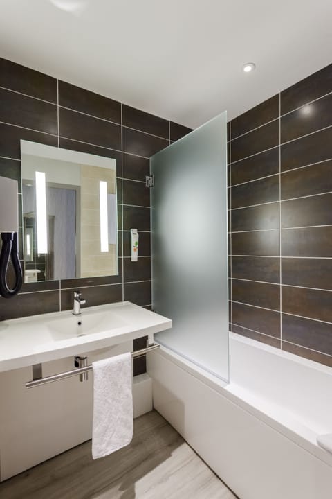 Eco-friendly toiletries, hair dryer, towels