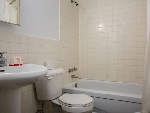 Room, 2 Queen Beds | Bathroom | Free toiletries, hair dryer, towels