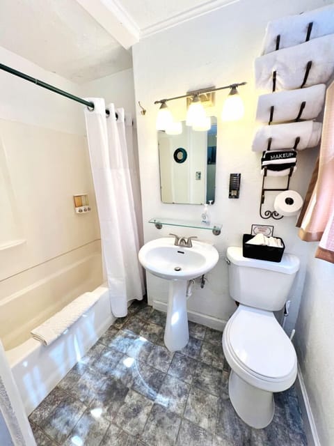 1-Copper King Suite | Bathroom | Hair dryer, towels