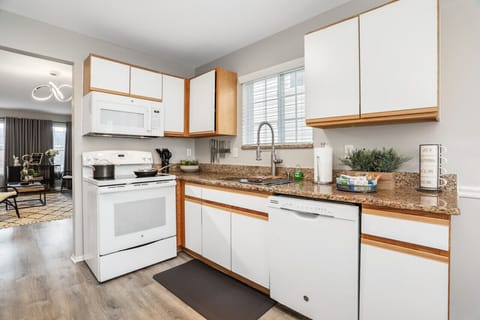 Get your apron on and let's whip up a kitchen masterpiece! With top-of-the-line appliances, utensils, and even a dishwasher, this kitchen is your ticket to culinary excellence.