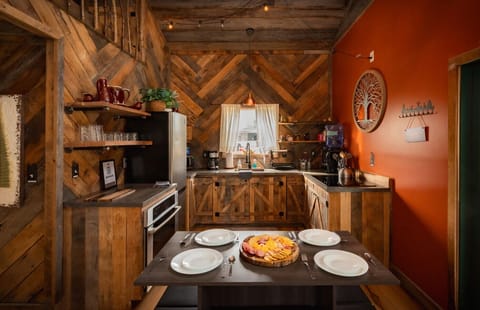 Farmhouse woodwork, forest charm, and a seat at the table just for you.