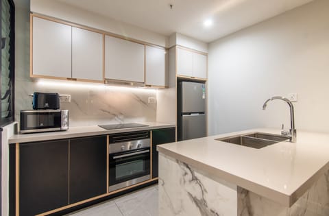 Luxury Apartment | Private kitchen | Fridge, microwave, oven, stovetop