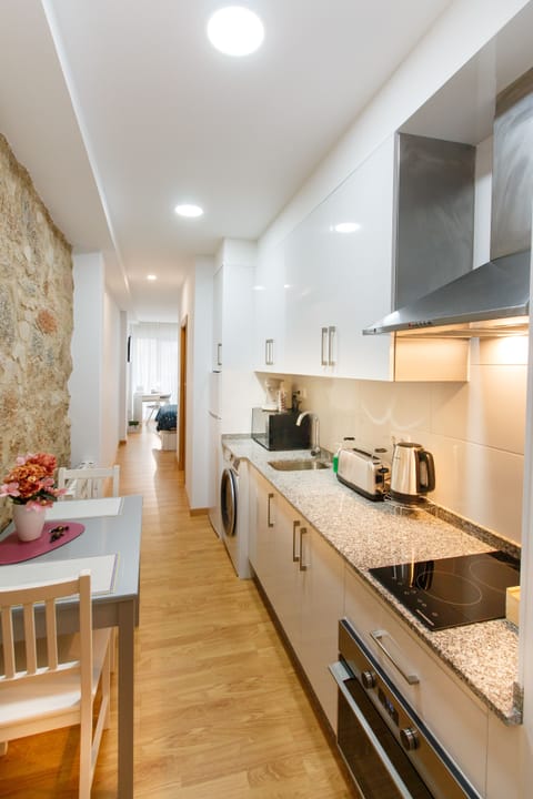 Design Apartment | Private kitchen | Full-size fridge, microwave, oven, stovetop