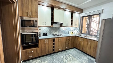 Presidential Apartment, 3 Bedrooms | Private kitchen | Fridge, microwave, stovetop, dishwasher