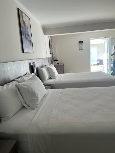 Standard Room, 2 Double Beds, Non Smoking, Pool View | In-room safe, desk, blackout drapes, iron/ironing board