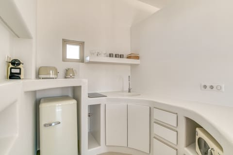 Superior Suite | Private kitchen | Espresso maker, coffee/tea maker, dining tables