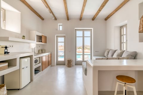 Deluxe Suite, 1 Bedroom | Private kitchen | Espresso maker, coffee/tea maker, dining tables