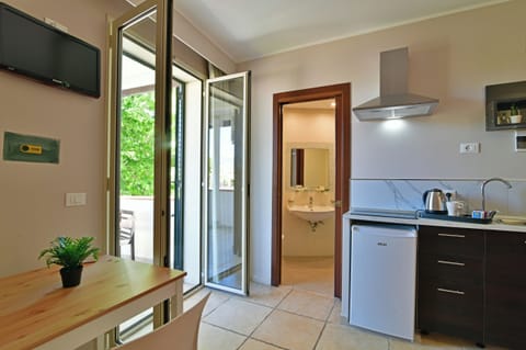 Classic Apartment, Garden View | In-room safe, iron/ironing board, free WiFi