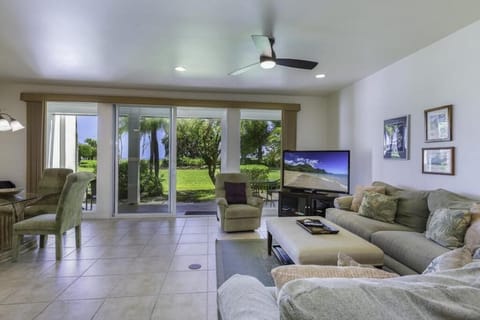 Open concept living and dining room with private lanai
