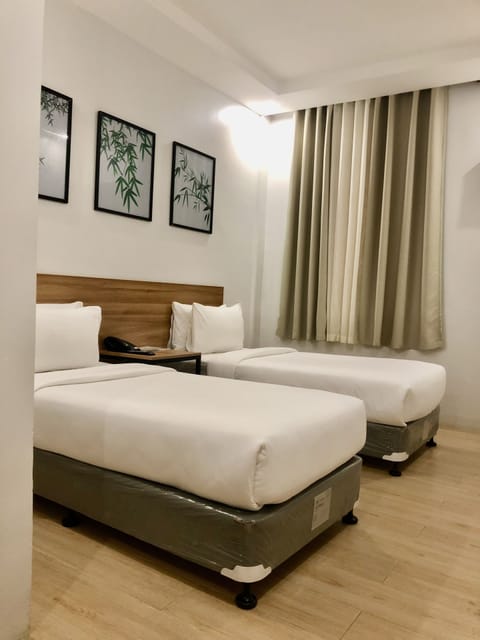 Standard Twin Room, 2 Twin Beds | Premium bedding, down comforters, desk, free WiFi