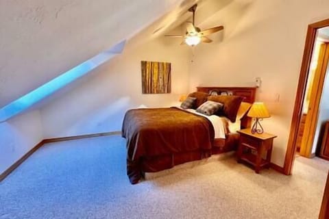 The second bedroom offers privacy and a view that creates a sense of seclusion.