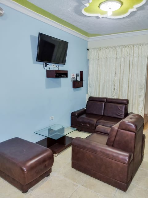 Classic Room | Living area | 54-inch flat-screen TV with cable channels, TV, pay movies