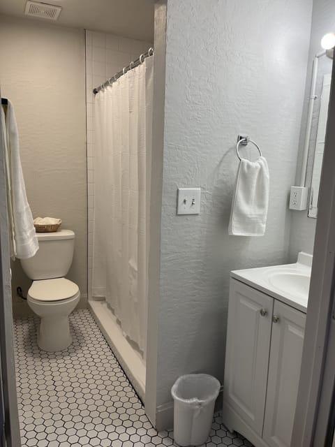 Room, Multiple Beds | Bathroom | Separate tub and shower, towels, toilet paper