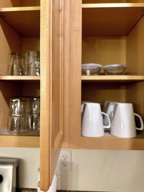 Coffee mugs and water glass.