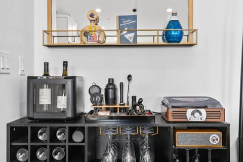 upright wine chiller, record player and BT speaker