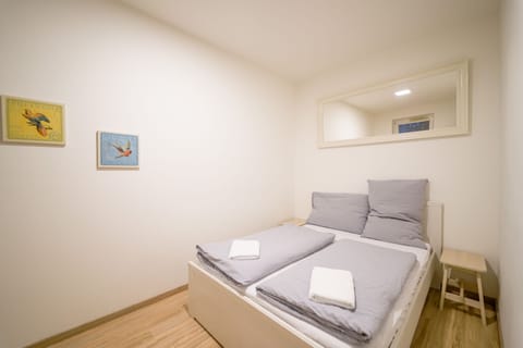 Executive Apartment | Desk, iron/ironing board, free WiFi