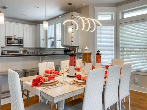 The beautiful dining table seats 8 and simply begs to have a family meal shared around it.