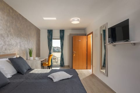 Family Room, 1 Bedroom, Sea Facing (Family Resort Santa Maria II Room 201) | 1 bedroom, laptop workspace, bed sheets